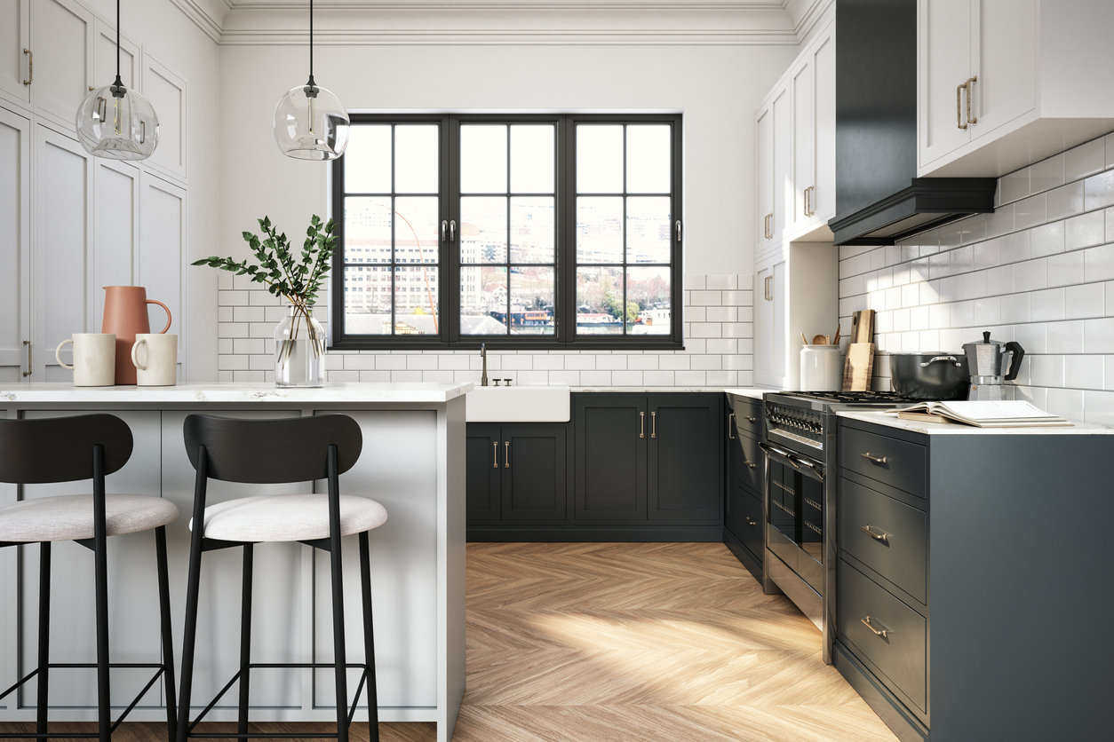 Bright kitchen with big window, dark kitchen cupboards with white backsplash and walls